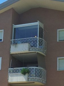 Pergotenda vista dal basso Roma VetroeXpert Vetrate Pieghevoli e vetrate a scomparsa Glassroom
