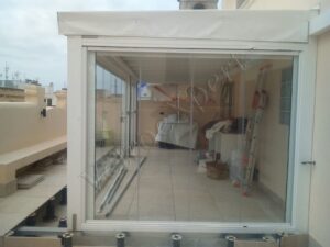 Intervento di installazione vetrate panoramiche apacchetto in Sardegna come e Roma VetroeXpert Vetrate Pieghevoli e vetrate a scomparsa Glassroom