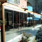 Vetrate a scomparsa Glassroom parete ristorante Vista esterna Roma VetroeXpert Vetrate Pieghevoli e vetrate a scomparsa Glassroom