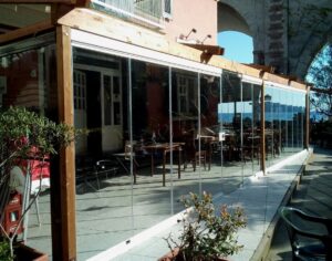 Vetrate panoramiche fronte mare installate a Portofino Roma VetroeXpert Vetrate Pieghevoli e vetrate a scomparsa Glassroom