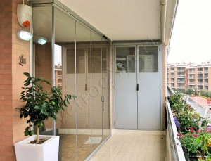 Vista esterna balcone Vetrata pieghevole Roma VetroeXpert Vetrate Pieghevoli e vetrate a scomparsa Glassroom 1