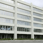 Edificio ad uffici pellicolato Roma VetroeXpert Pellicole per vetri Sicurezza Termica Protezione solare Estetica