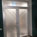 porta in cristallo a battente