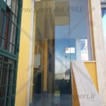 porta a battente in cristallo per condominio 2