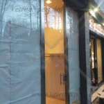 porta a battente in vetro per negozio