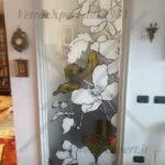 porta in cristalllo decorata con fiori