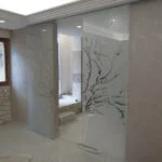 porta scorrevole due battenti con decorazione albero